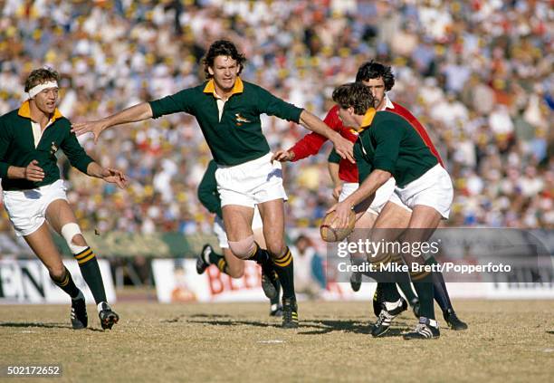 Left to right - Rob Louw, Morne du Plessis, Willie du Plessis of South Africa and Jeff Squire of the British Lions in action during the 2nd Test...