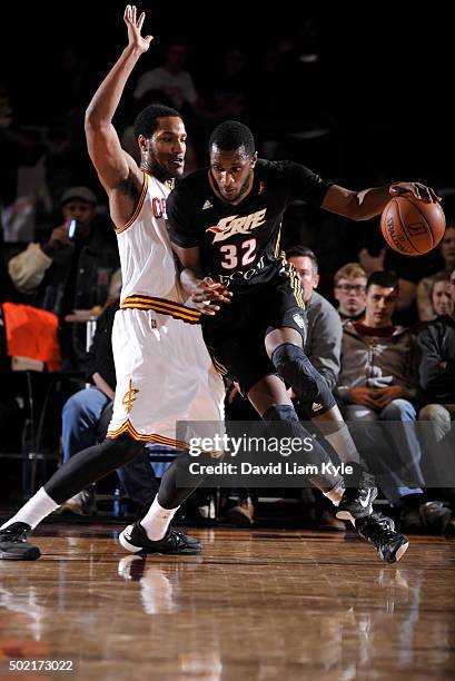 Nnanna Egwu of the Erie BayHawks drives against C.J. Wilcox of the Canton Charge at the Canton Memorial Civic Center on December 19, 2015 in Canton,...