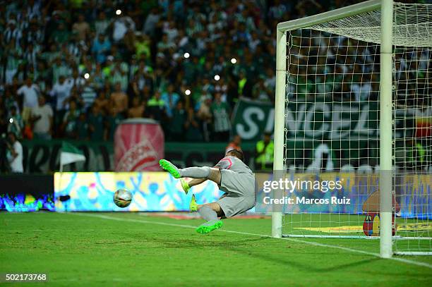 Franco Armani of Atletico Nacional stops a penalty during the penalty shootout of the second leg final match between Atletico Nacional and Atletico...