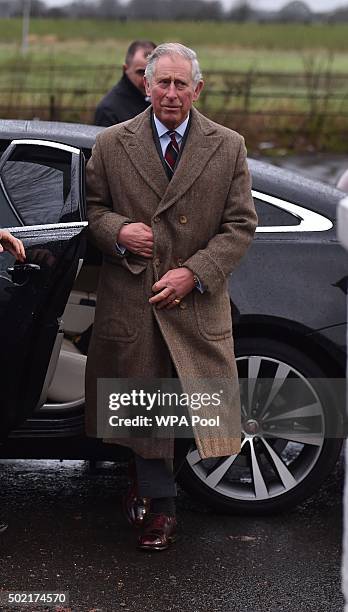 Prince Charles, Prince of Wales during a visit to victims of the flooding caused by Storm Desmond in Warwick Road on December 21 in Carlisle, United...