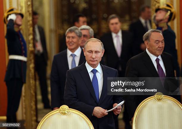 Russian President Vladimir Putin , Kyrgyz President Almazbek Atambayev and Kazakh President Nursultan Nazarbayev seen during the Summit of Eurasian...