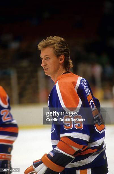 Wayne Gretzky of the Edmonton Oilers skates on the ice during warm-ups before an NHL game against the New Jersey Devils on March 23, 1987 at the...