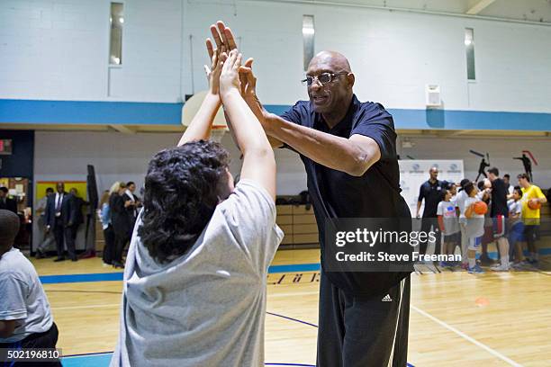 Former NBA player, Bob Lanier takes part in an NBA Cares clinic for Good Morning America at the Madison Square Boys and Girls Club on December 12,...