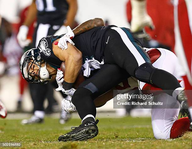 Riley Cooper of the Philadelphia Eagles is tackled after making a catch in the third quarter against the Arizona Cardinals at Lincoln Financial Field...