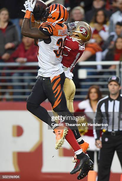 Shawn Williams of the Cincinnati Bengals intercepts a pass intended for Jerome Simpson of the San Francisco 49ers during their NFL football game at...