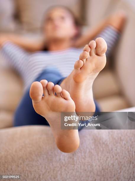 sleep was the only thing on her mind... - female feet soles stockfoto's en -beelden