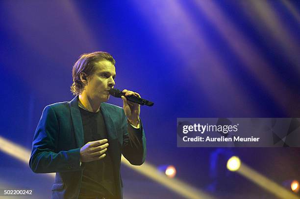 Benabar performs on stage during the concert given at Accor Hotels Arena on December 21, 2015 in Paris, France.12,000 employees, volunteers and...