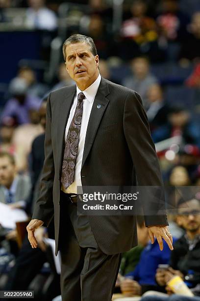 Head coach Randy Wittman of the Washington Wizards looks on in the first half against the Sacramento Kings at Verizon Center on December 21, 2015 in...