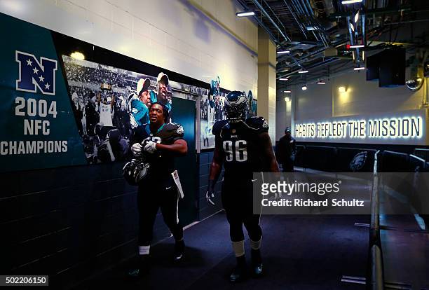 Cedric Thornton and Bennie Logan of the Philadelphia Eagles leave their locker room before a game against the Arizona Cardinals at Lincoln Financial...