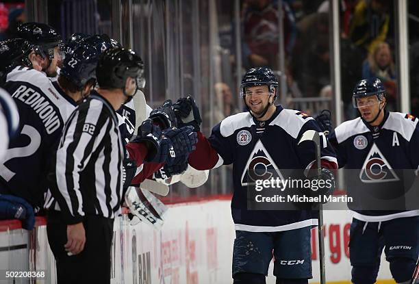 John Mitchell of the Colorado Avalanche celebrates with his bench after a goal against the Toronto Maple Leafs at the Pepsi Center on December 21,...