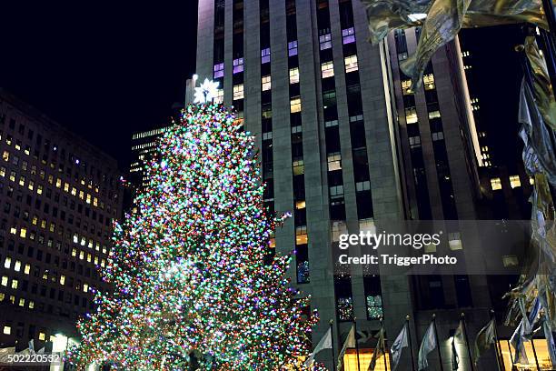 christmas tree at rockefeller center in new york city - annual an evening of stars stock pictures, royalty-free photos & images