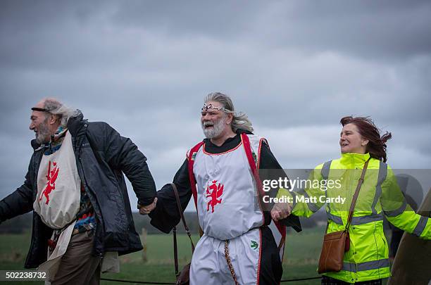 Arthur Pendragon leads a ceremony as druids, pagans and revellers gather at Stonehenge, hoping to see the sun rise, as they take part in a winter...