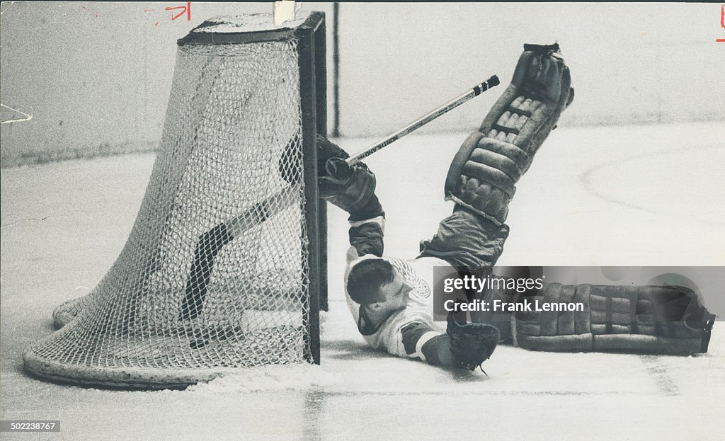 All in a nights work, as an all-star goalie for the Detroit Red Wings, these acrobatics were common
