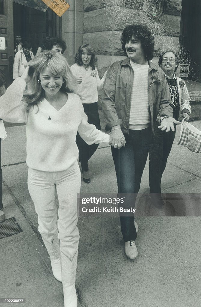 Canadian rock star Burton Cummings and his bride, Cheryl DeLuca, are(02)