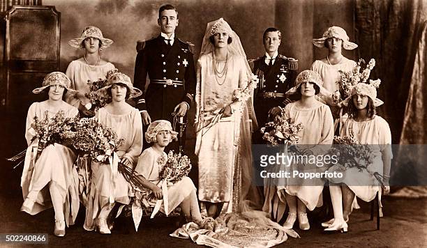 The formal wedding portrait of Lord and Lady Louis Mountbatten at Brook House, Park Lane, London on 18th July 1922. Back row, left to right: Princess...