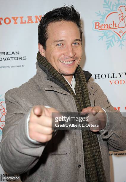 Actor Travis Aaron Wade arrives for the 2015 Babes In Toyland And BenchWarmer Charity Toy Drive held at Avalon on December 9, 2015 in Hollywood,...