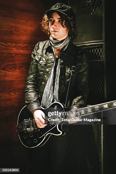 Portrait of Welsh musician Johnny Bond, guitarist with indie rock group Catfish And The Bottlemen, photographed before a live performance at the O2...