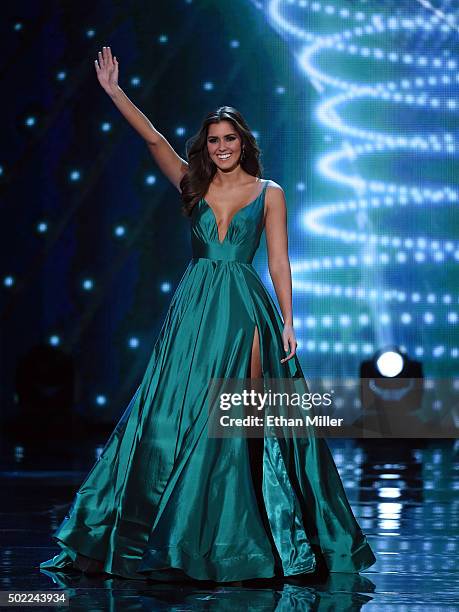 Miss Universe 2014 Paulina Vega waves during the 2015 Miss Universe Pageant at The Axis at Planet Hollywood Resort & Casino on December 20, 2015 in...