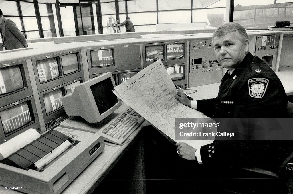 Command centre: Superintendant Carl Barnhart of Peel Regional police is sitting at the control centr