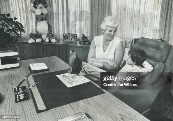 A Politician in the making. Mayor Evelyn Buck of Aurora gives 7-year-old Shawn McClenny a few tips o A Politician in the making. Mayor Evelyn Buck of Aurora gives 7-year-old Shawn McClenny a few tips o