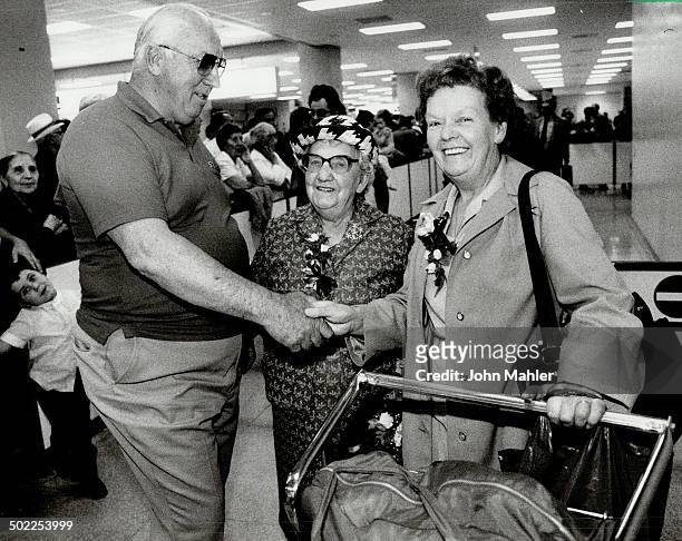 Long separation: Rose Ravenscroft; 84; and her daughter Beatrice Montgomery were warmly greeted at Pearson Airport last night by George Higgins; the...