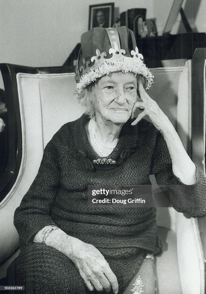 Neighborhood queen: Eileen Robertson; 97; who has lived on Rathnelly Ave. since 1924; shows off her