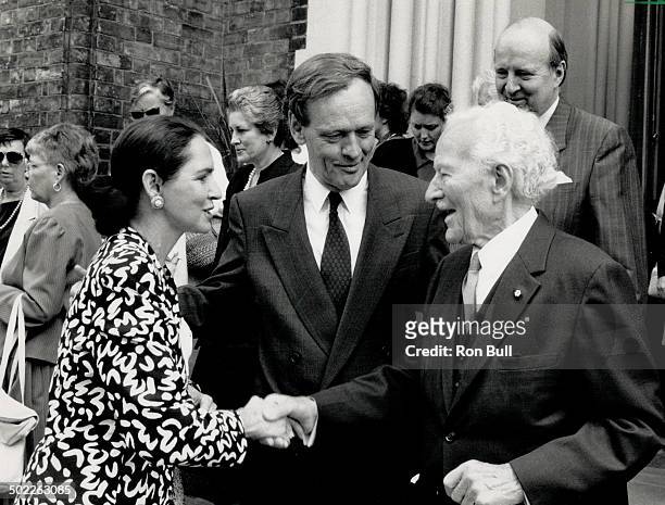 Solemn Occasion: Jean Chretien, centre, and his wife, Aline, greet former Governor General Roland Michener at the funeral of lawyer Pierre Genest in...