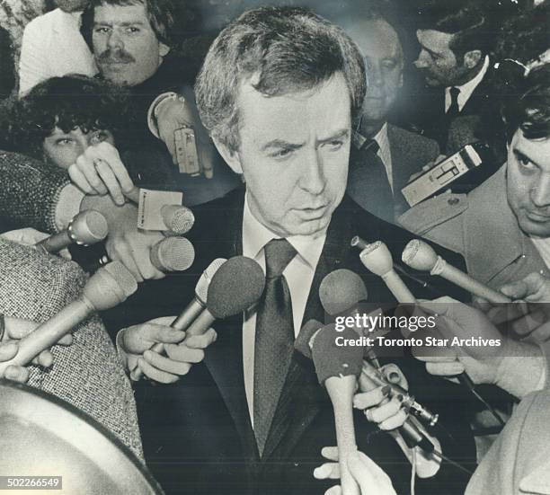 It' over: Mobbed by reporters, Joe Clark tells them he has just submitted his resignation as Prime Minister to a recuperating Governor-General Ed...