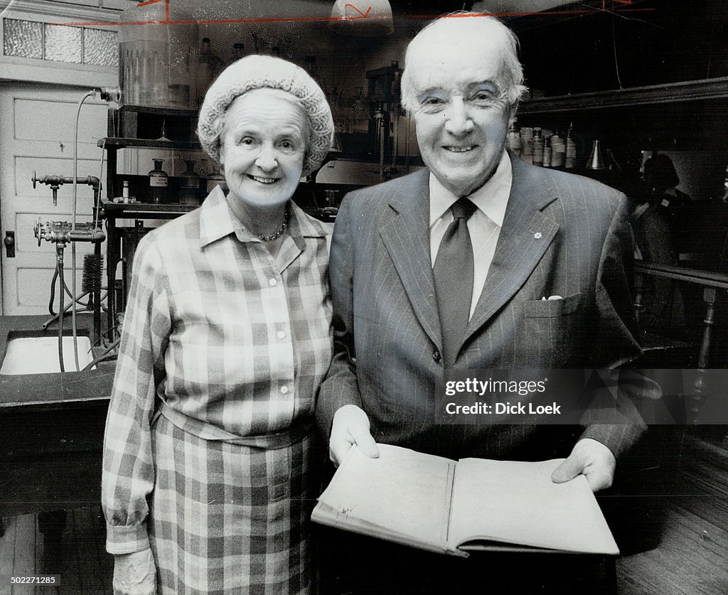 Co-discoverer of insulin, Dr. Charles H. Best, 77, and his wife look over notes last night he and Si