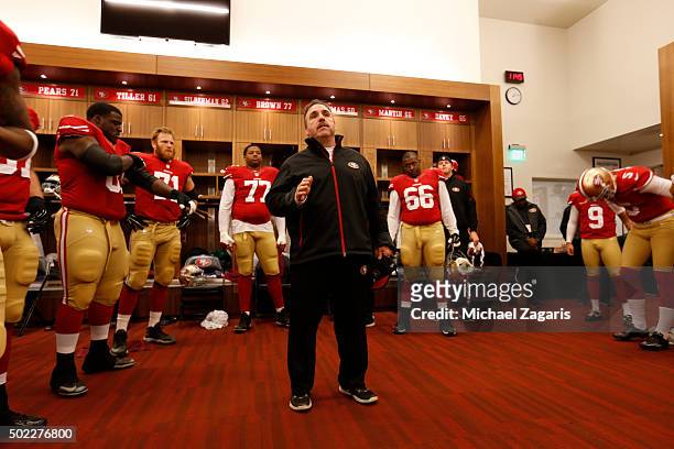 Head Coach Jim Tomsula of the San Francisco 49ers addresses the team in the locker room prior to the game against the Cincinnati Bengals at Levi...