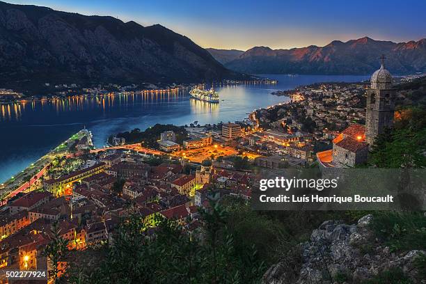 kotor bay and sunset - baltische landen stockfoto's en -beelden