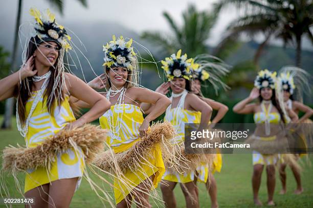 swaying to the sound of the music - hula dancing stock pictures, royalty-free photos & images