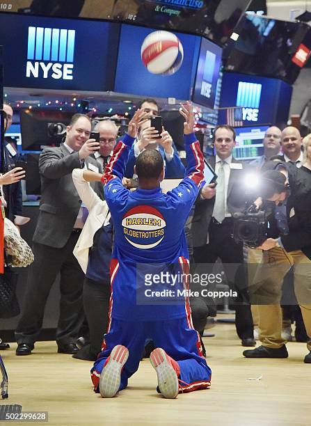 Handles Franklin attempts a basket during as the Harlem Globetrotters Celebrate 90th Year At The New York Stock Exchange Opening Bell at New York...