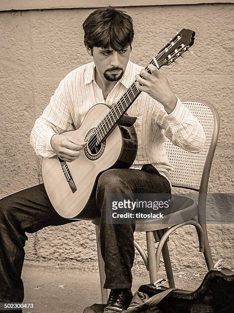 busker - classical guitarist stock pictures, royalty-free photos & images