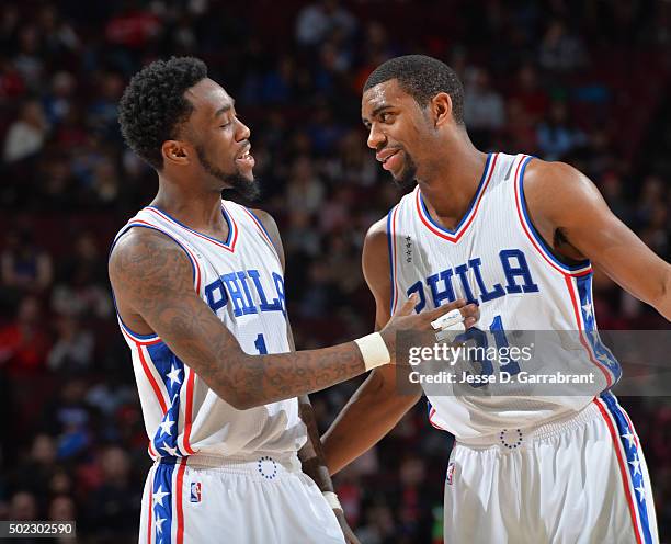 Tony Wroten and Hollis Thompson of the Philadelphia 76ers share a moment against the Memphis Grizzlies at Wells Fargo Center on December 22, 2015 in...