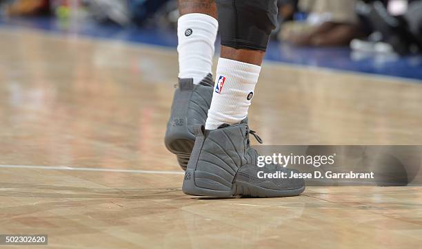 Tony Wroten of the Philadelphia 76ers showcases his Jordan 12s against the Memphis Grizzlies at Wells Fargo Center on December 22, 2015 in...