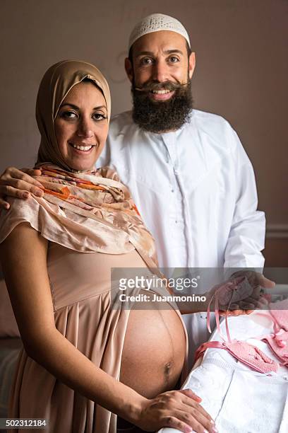 smiling middle eastern couple - imam stock pictures, royalty-free photos & images