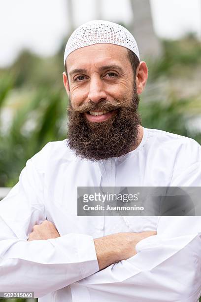 middle eastern man - imam stock pictures, royalty-free photos & images