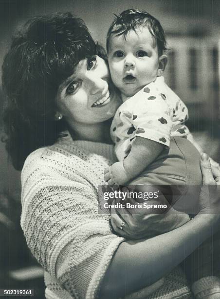 Maggie and son make debut. Margaret Kemper; ex-wife of former prime minister Pierre Trudeau; hugs her son; Kyle; 5 months old. She is married to...