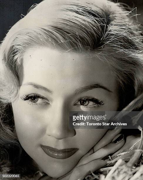 Fair-Haired Charmer; Gloria Grahame; Los-Angeles girl who had success as comedienne on Broadway before going to movies. She appeared in 'It Happened...
