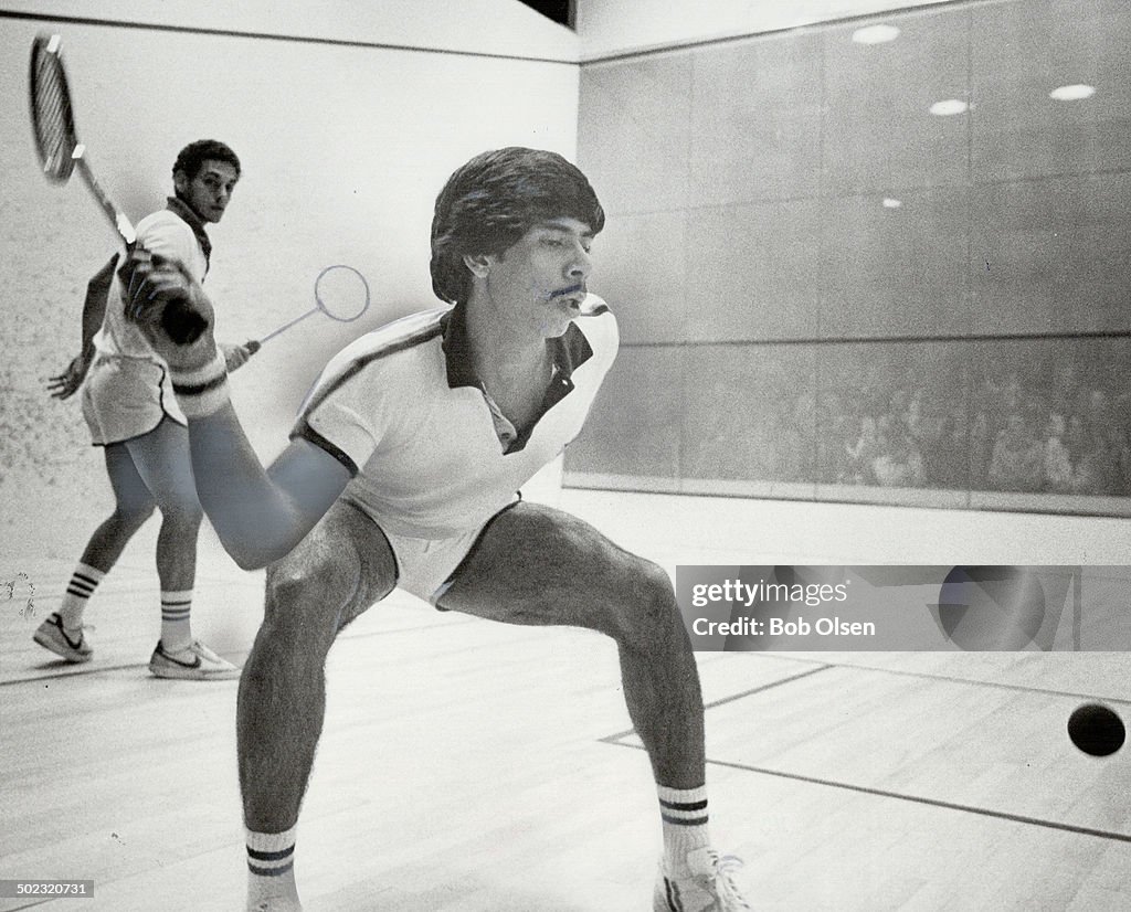 Ready to pounce: As Egypt's Gamal Awad watches intently in the background; Pakistan's Jahangir Khan 