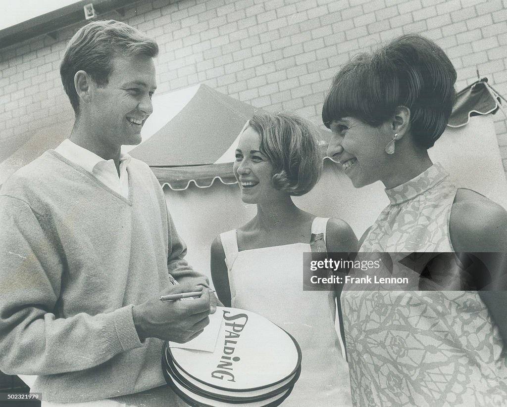South African tennis ace Cliff Drysdale takes time out during Ontario Centennial open tournament to