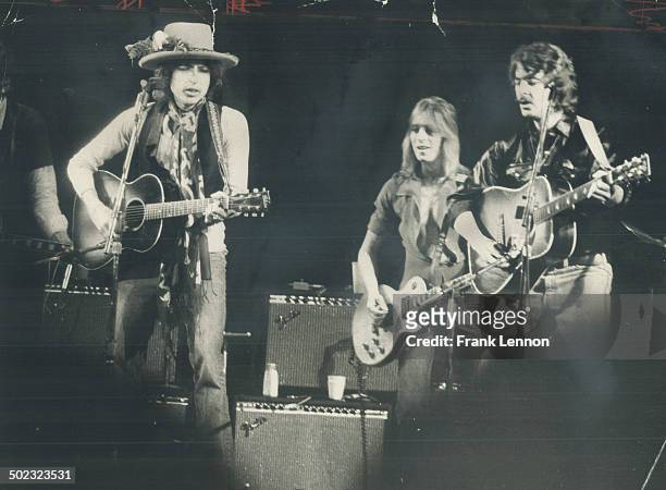 His rolling thunder revue making its way toward New York; Bob Dylan last night took centre stage before 16;000 people at Gardens; accompanied by a...