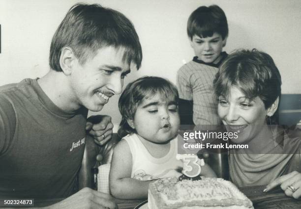 Happy 3rd birthday; Lindsay! As her parents Jim and Christine watch; Lindsay Eberhardt - who turned 3 yesterday - blows out the candle on her...