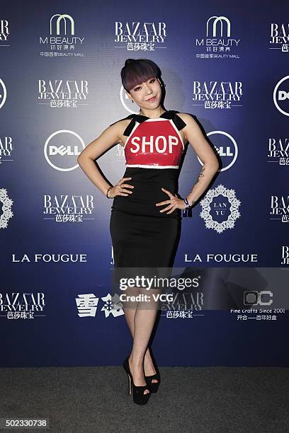 Singer MoMo Wu attends Bazaar Jewelry gala dinner at Four Seasons Hotel on December 22, 2015 in Beijing, China.