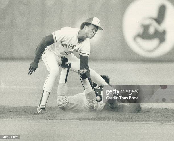 Gunned down: Teams haven't been nabbing too many speedy runners this year; but Jays shortstop Tony Fernandez withstood this headfirst slide by...