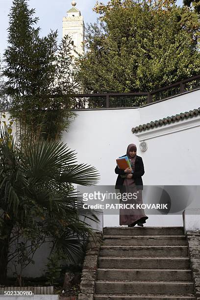 Student arrives to follow a theology training class for futur imams and clerics at the Al-Ghazali institute of the Grand Mosque of Paris on December...