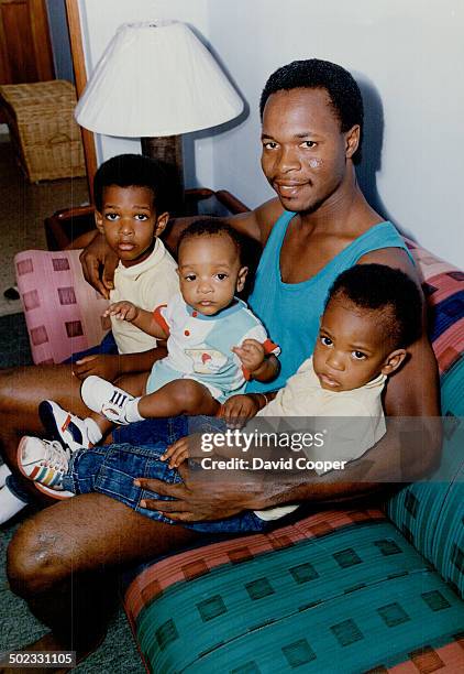 Blue Jays shortstop Tony Fernandez poses at his home in the Dominican Republic with sons Joel; 4 1/2; Abraham; seven months; and Jonathan; 2 1/2....