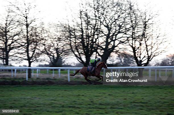 Jamie Moore riding Sire De Grugy on the gallops at Gary Moore's Ciswood Stables on December 23, 2015 in Horsham, England.