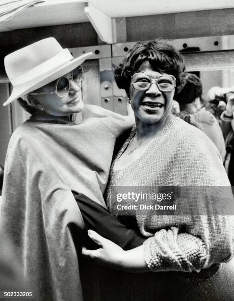 Crossing paths: Musical veterans Peggy Lee and Ella Fitzgerald share an embrace in a dressing room at the Royal York hotel and no doubt a few words...